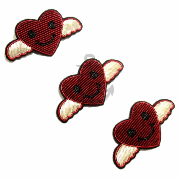 Hand embroidered brooches